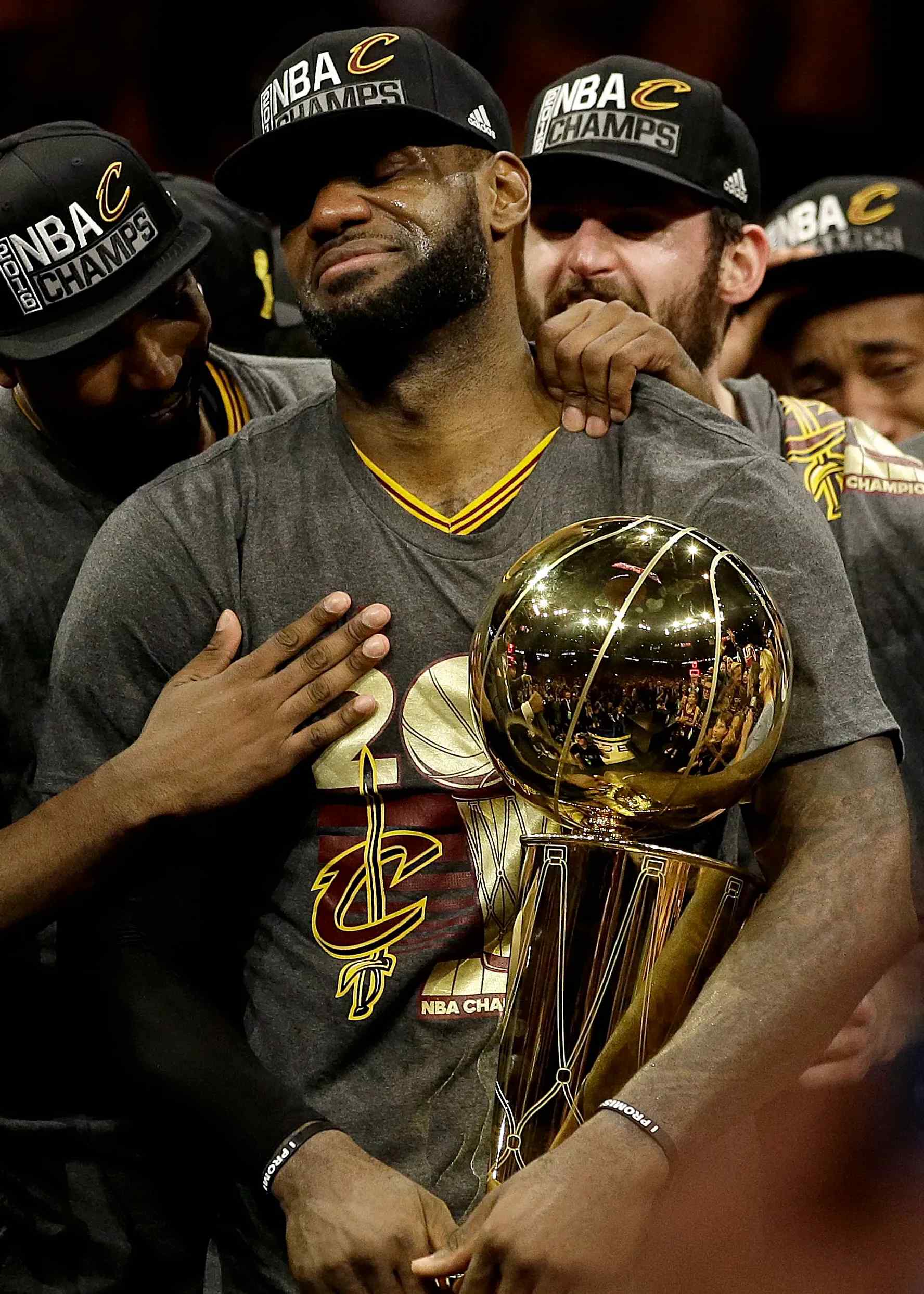 LeBron James winning an NBA Championship with the Cleveland Cavaliers.